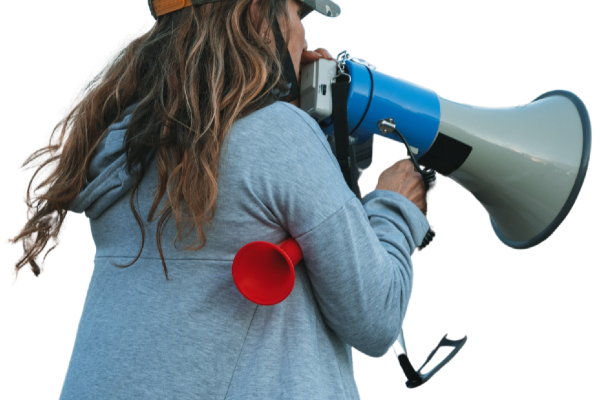 A woman with a megaphone at a campaign rally
