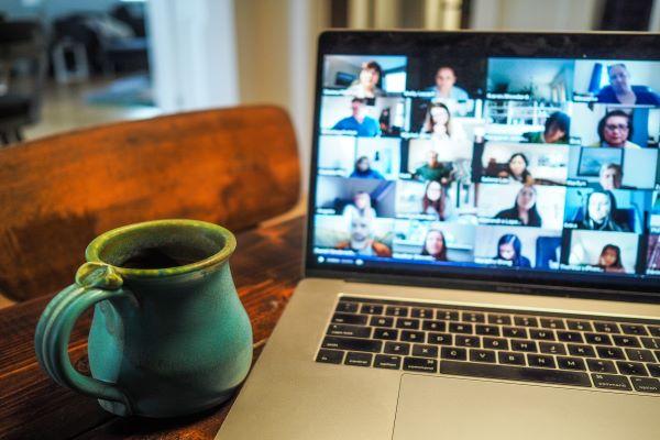 A laptop and cup