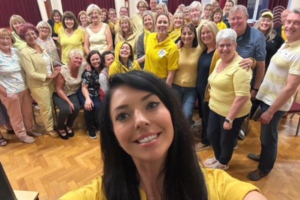 Group photo wearing yellow