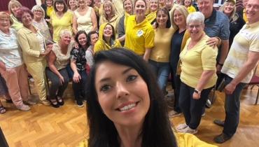 Group photo wearing yellow